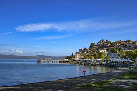 The lakeside promenade of Anguilara Sabazia, a medieval town overlooking a lake in the province of Rome.のeditorial素材