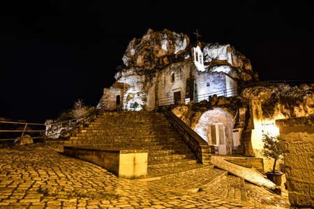 Night view of Matera, an ancient city built into the rock. It is located in the Basilicata region