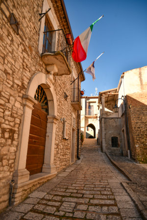 A street among the characteristic houses of Casalbore, a mountain village in the province of Avellinoの写真素材