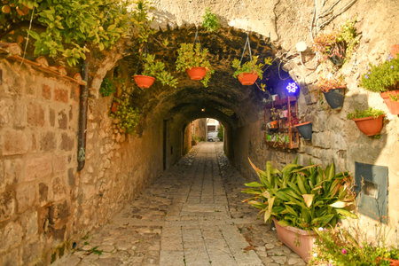 A narrow street among the old stone houses of the oldest district of the city of Caserta.の写真素材