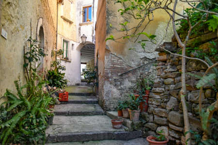 A narrow street among the old stone houses of Altavilla Silentina, town in Salerno province.