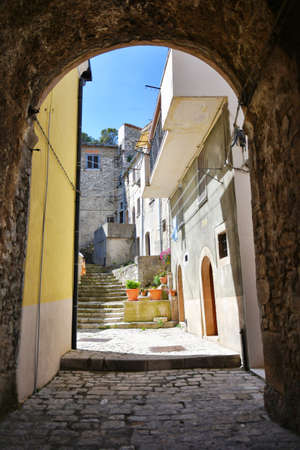 A small street between the old houses of Morcone, a village in the province of Benevento.の写真素材