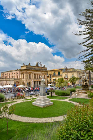 Noto, Italy, 06/02/2019. People in a square of a Sicilian city.のeditorial素材
