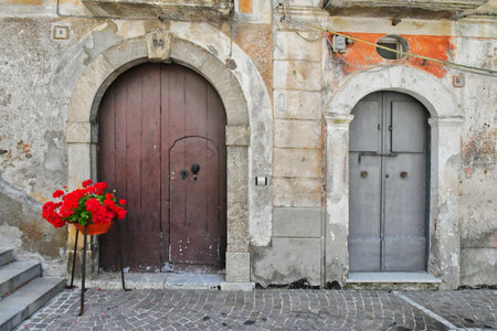 Marsicovetere, Italy, 05/28/2022. The door of an old house in a village in the mountains of Basilicataのeditorial素材