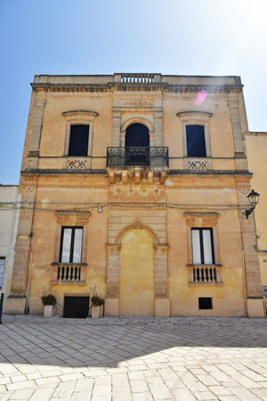 The facade of an old house in Presicce, village in Puglia region.の写真素材