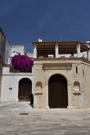 The facade of a characteristic house in Specchia, a medieval town in the Puglia region of Italy.の写真素材