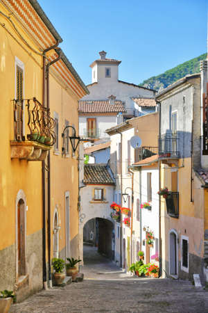 A narrow street between the old stone houses of Cansano, a medieval village in the Abruzzo region.