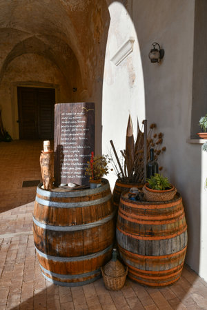 Two barrels for wine in the cloister of the medieval monastery of San Magno in the Lazio region.のeditorial素材