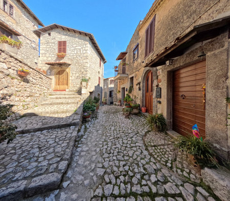 A narrow street among the old houses of Fumone, a historic town in the state of Lazio.の写真素材