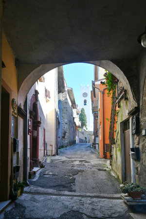 A narrow street among the old houses of Torrice, a medieval town in the province of Frosinone.の写真素材