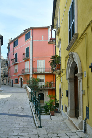 A narrow street among the old houses of Guardia Sanframondi, a small town of Benevento province.の写真素材