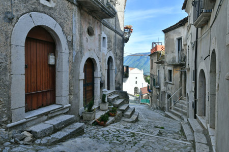 A narrow street among the old houses of Guardia Sanframondi, a small town of Benevento province.の写真素材