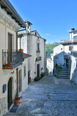 A narrow street among the old houses of Rivisondoli, a small town in the mountains of central Italy.の写真素材