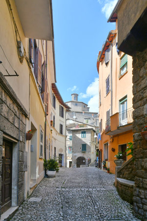 A narrow street among the old houses of Subiaco, a medieval town near Rome.の写真素材