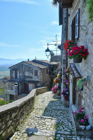 A narrow street among the old houses of Artena, a medieval town near Rome.の写真素材