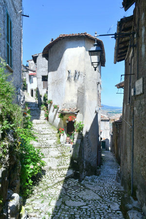 A narrow street among the old houses of Artena, a medieval town near Rome.の写真素材
