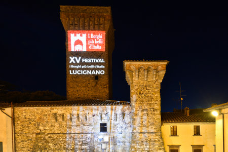 The luminous writing of an event in the medieval neighborhood of Lucignano, a city in Tuscany.のeditorial素材