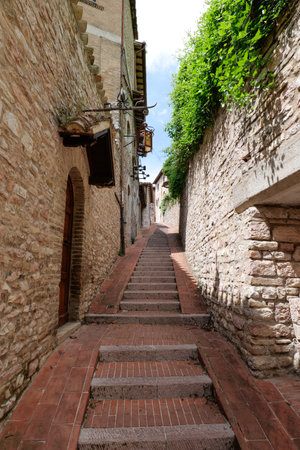 A small street in the historic center of Assisi, a town in Umbria.の写真素材