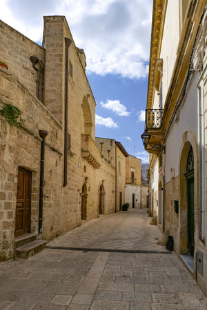 A street in the medieval quarter of Galatone, an old town in Puglia.の写真素材