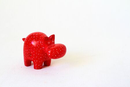Decorated model of a white-spotted red toy hyppoの写真素材
