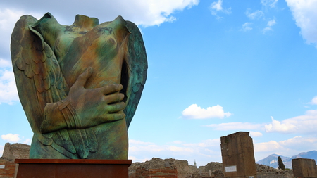 Pompeii, Italy - March 28, 2017: Sculptures of the Polish sculptor Igor Mitoraj on display at Pompeii archaeological site, the ancient Roman city, destroyed in 79 BC by the eruption of Mount Vesuvius.のeditorial素材