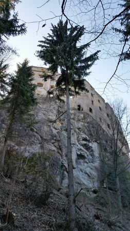The ruins of a medieval castle Likava, rising above the village Likavka in district RuÃÂ¾omberok, in the ÃÂ½ilina Region of northern Slovakiaのeditorial素材