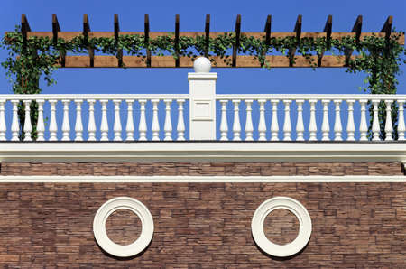 Beautiful terrace with white fence and green leafs