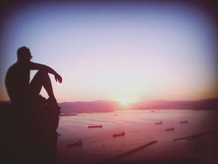 Clouds come floating into my life, no longer to carry rain or usher storm, but to add color to my sunset sky. Thinking about life with this beautiful view it's definitely a pleasure.の素材