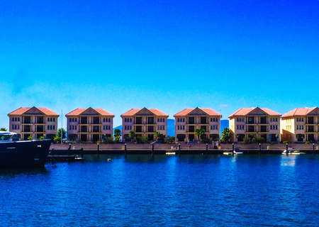 Home Exterior, those 6 houses is called the island because it is floating in the sea with the berth parking spaces outside your door, they are between 2 seas with lovely view to Africa and Spain , on the other side view to the rock of our homeland.の素材