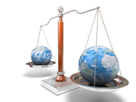 Globes on balance scaleの写真素材