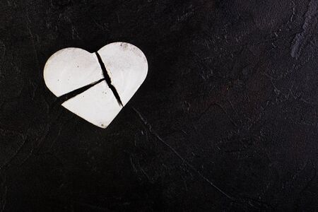 Protein is a broken heart against a concreteの写真素材
