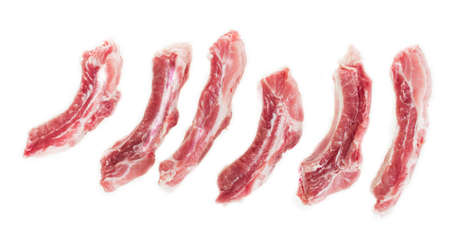 Sliced raw pork ribs on a white background, isolateの写真素材