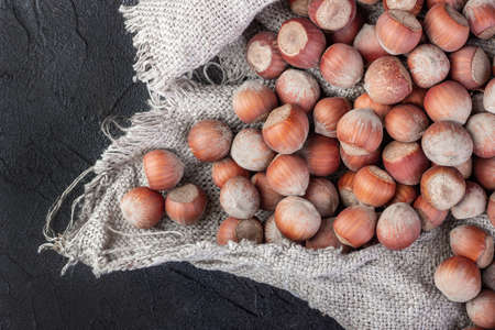 Hazelnut nuts poured into the burlapの写真素材