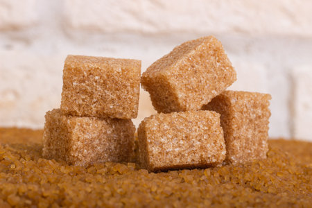 Sugar in the form of sand and cubesの写真素材