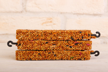 Honey grain sticks for birdsの写真素材