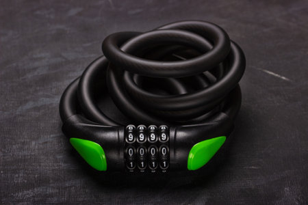 Bicycle combination lock on black backgroundの写真素材