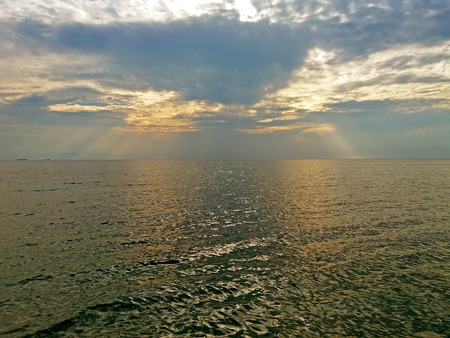 The rays of the sun over the Greek Mediterranean Seaの写真素材