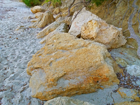 Rocks on the Greek beach, near the Mediterranean Seaの写真素材