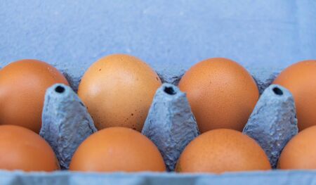 A box of chicken eggs close up.