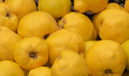 Quince fruit texture background, Benefits of quinces.