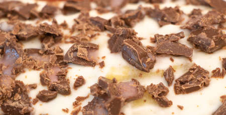 The surface of a homemade cake - with chocolate on topの写真素材