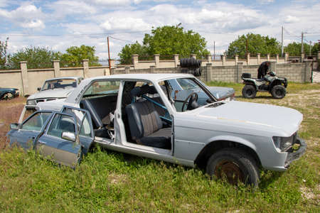 Chisinau, Moldova - June 5, 2020.. Some abandoned old cars without windows and doors.のeditorial素材