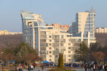 Chisinau, Moldova - March 27, 2021. A beautiful building in the park with blue sky.のeditorial素材