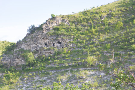A green cliff landscape on a sky bac.の写真素材