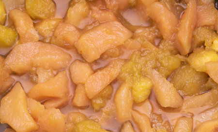 Homemade sweet Apple and pear jam mixed close up textured.の写真素材