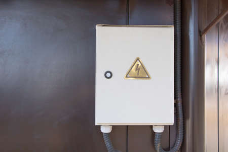 Closeup of an electricity control box on a wall.の写真素材