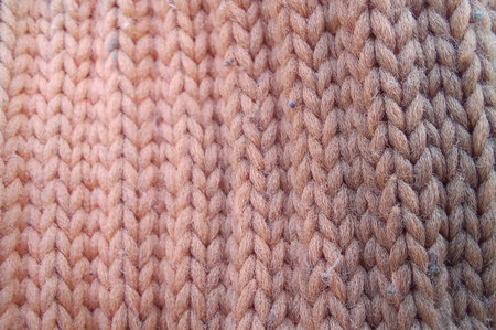 Knitted wool texture. Handmade knitting wool background. Close up of knitted wool texture
