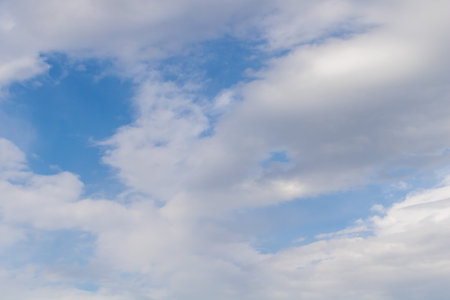 Clouds in the blue sky as a background for multiple applications.の写真素材