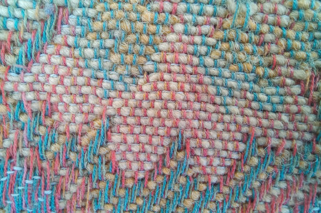 Close up of colorful woolen fabric texture. Background and texture.