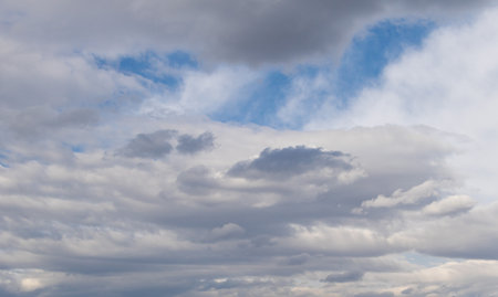 Cloudscape has been developing in gorgeous form. The sky is filled with white fluffy clouds.